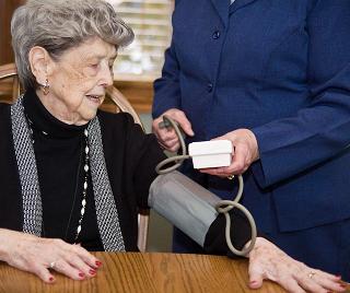 Staff Taking Blood Pressure at The Joy Home