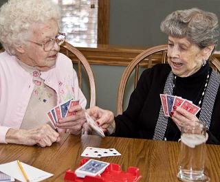 Residents Playing Cards at The Joy Home